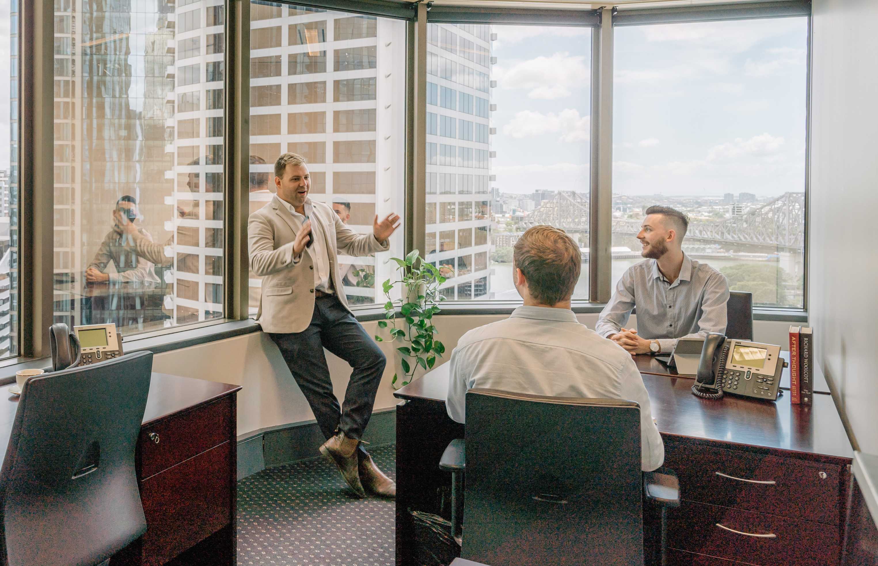 Modern serviced office space at 10 Eagle Street Brisbane, Australia, with people working