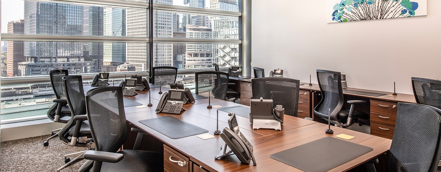 Fully equipped large office with Cisco phone, executive furniture, IT support, and a stunning city view.